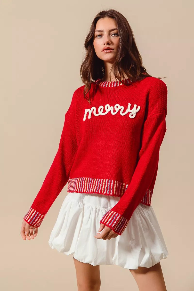 Folded Merry Christmas embroidered sweater for display