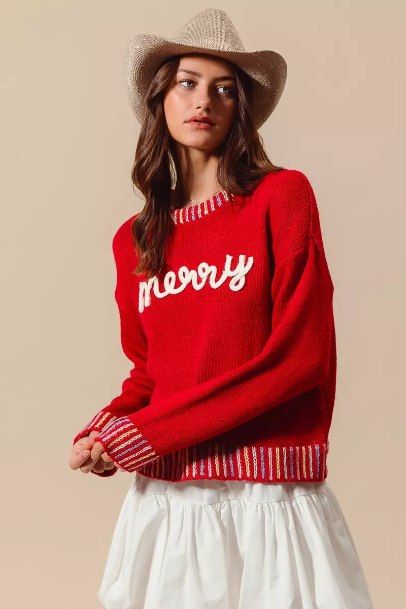 Folded Merry Christmas embroidered sweater for display