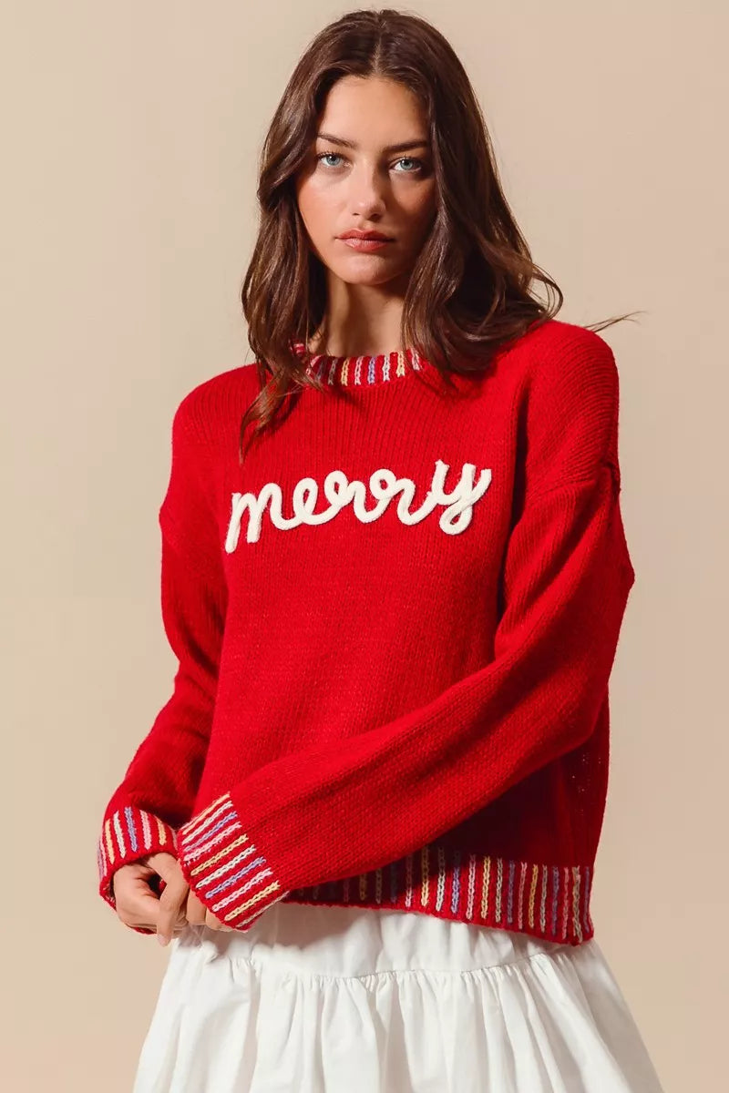 Folded Merry Christmas embroidered sweater for display