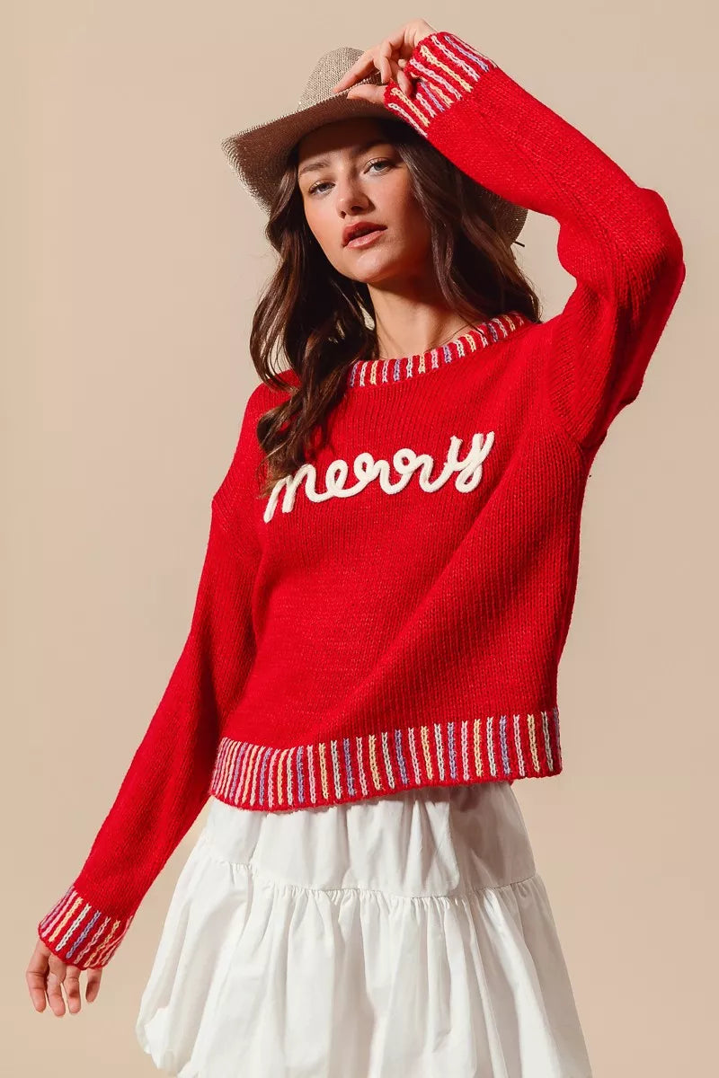 Folded Merry Christmas embroidered sweater for display