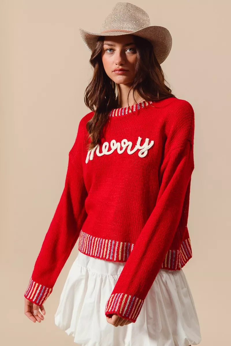 Folded Merry Christmas embroidered sweater for display