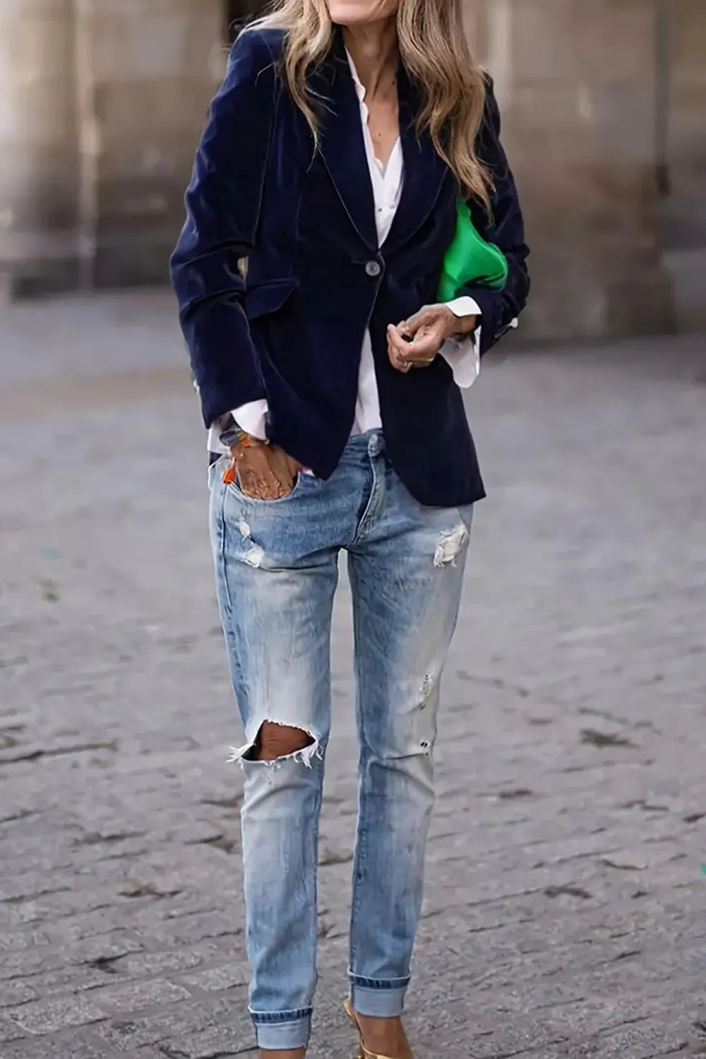 Woman wearing one button blazer