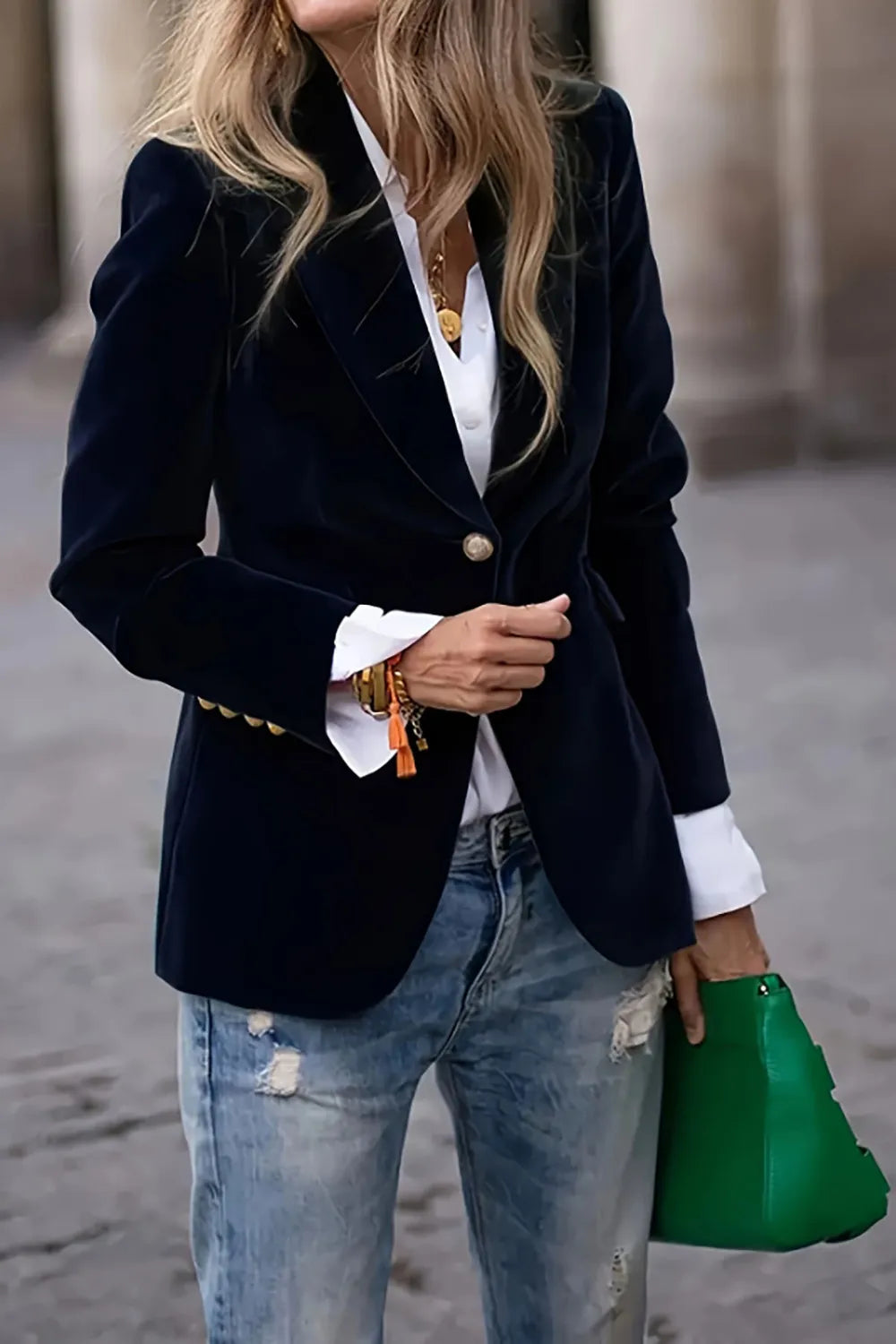 Woman wearing one button blazer