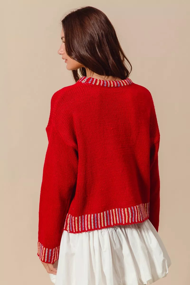 Folded Merry Christmas embroidered sweater for display