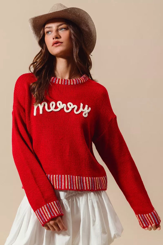 Folded Merry Christmas embroidered sweater for display